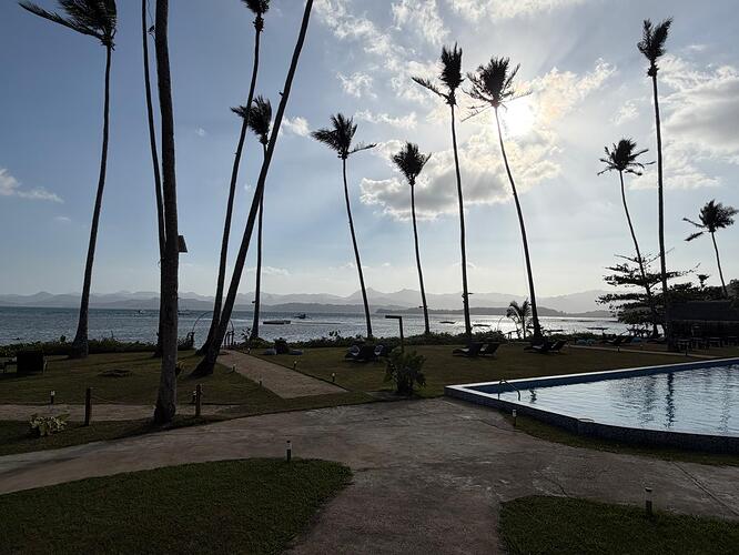 el-nido-resort-palms-pool-sunset