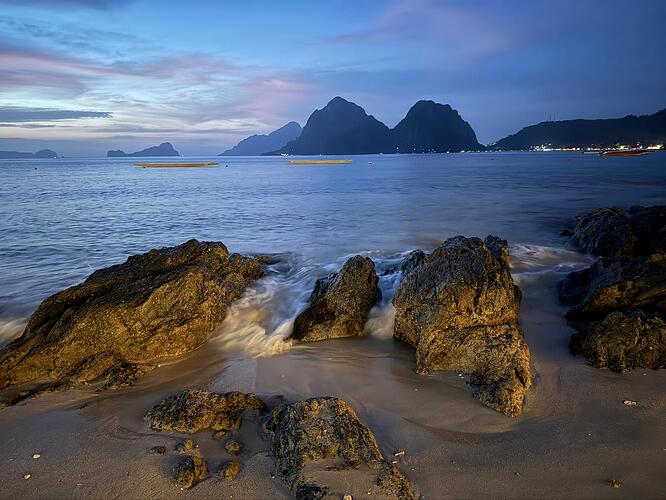 el-nido-blue-hour-rocks-surf